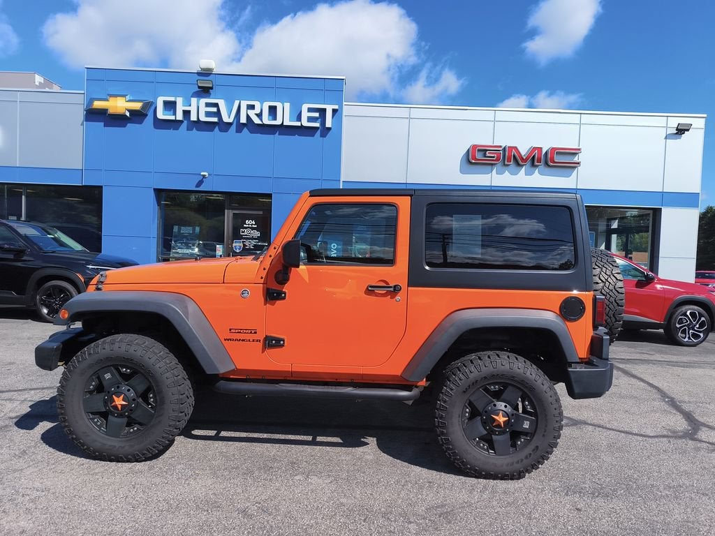 2012 Jeep Wrangler — rear three-quarter view