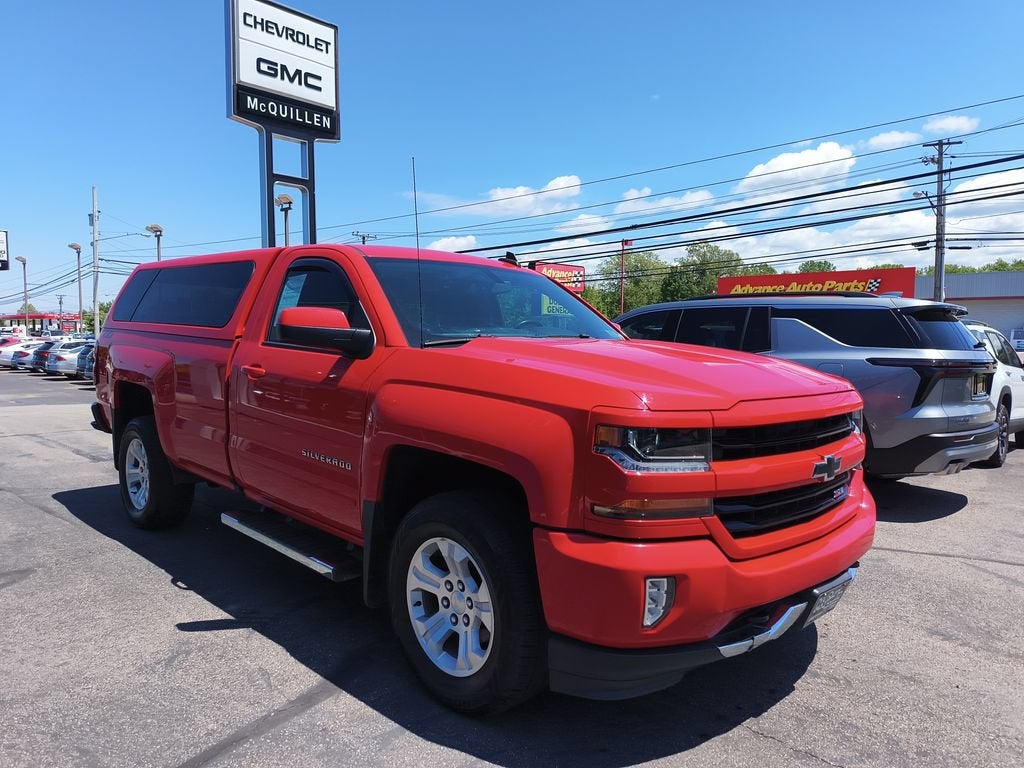 2018 Chevrolet Silverado 1500 LT in Red Hot — front three-quarter view