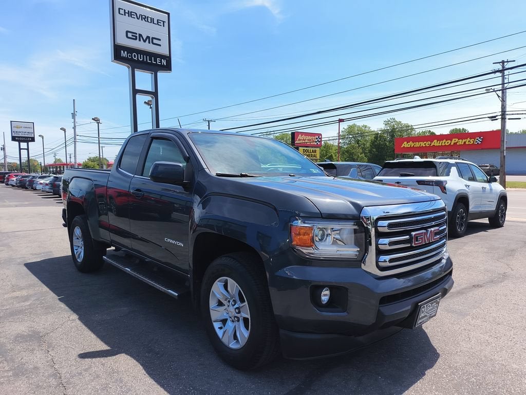 2016 GMC Canyon 4WD SLE in Cyber Gray Metallic — front three-quarter view