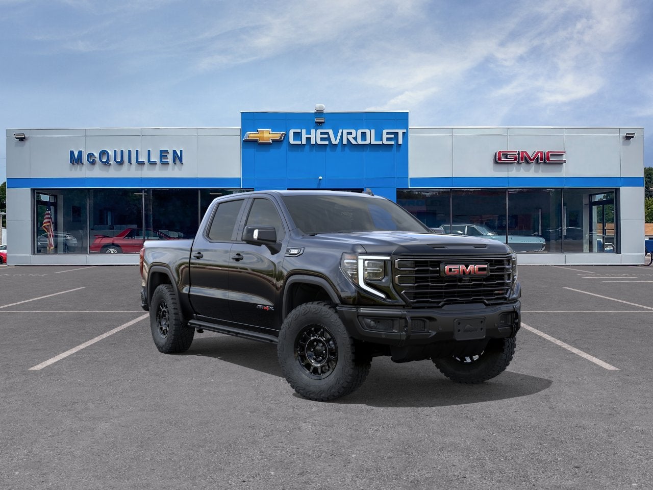 2026 GMC Sierra 1500 AT4X in Onyx Black — front three-quarter view