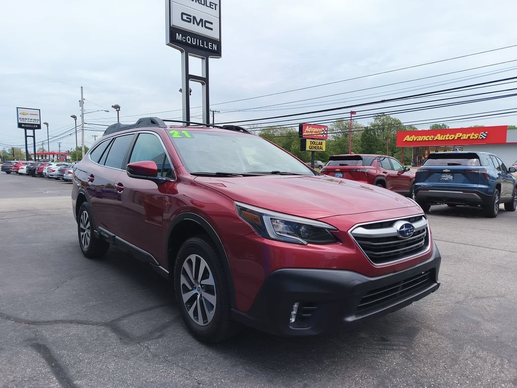 2021 Subaru Outback Premium in Red — front three-quarter view