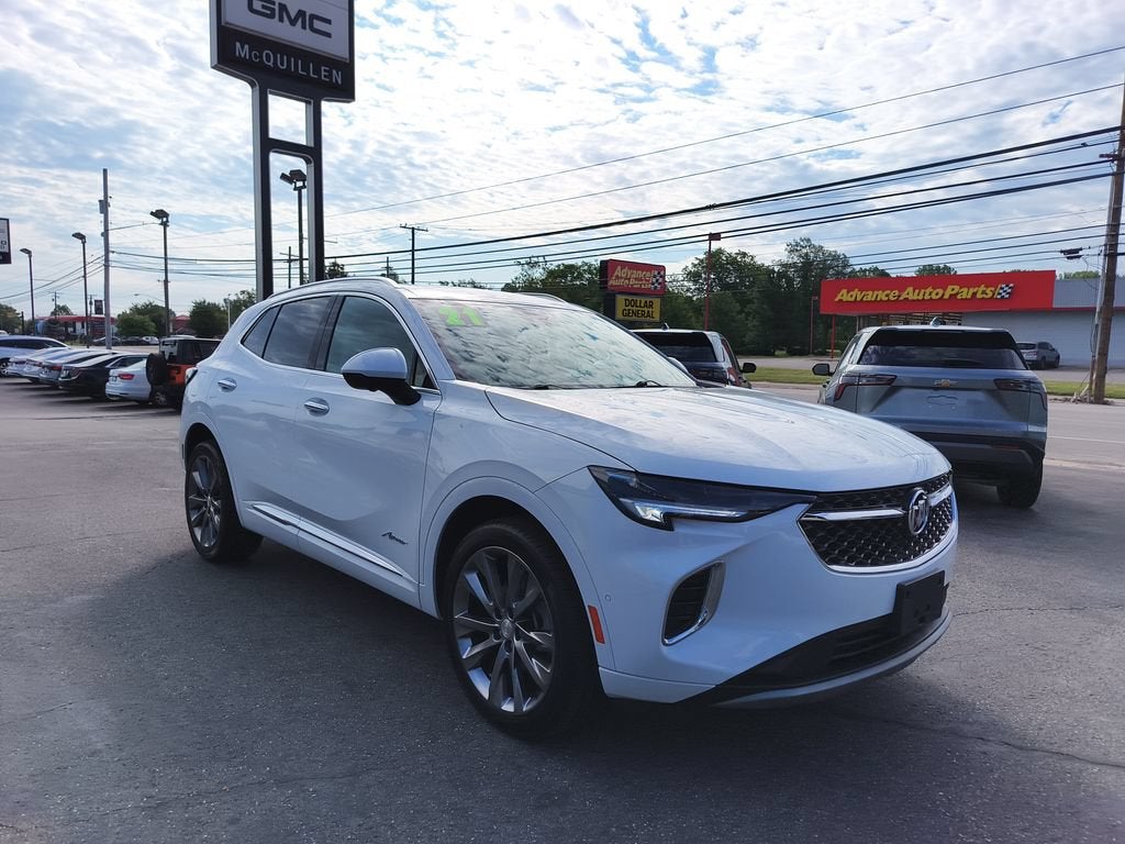 2021 Buick Envision Avenir in Summit White — front three-quarter view